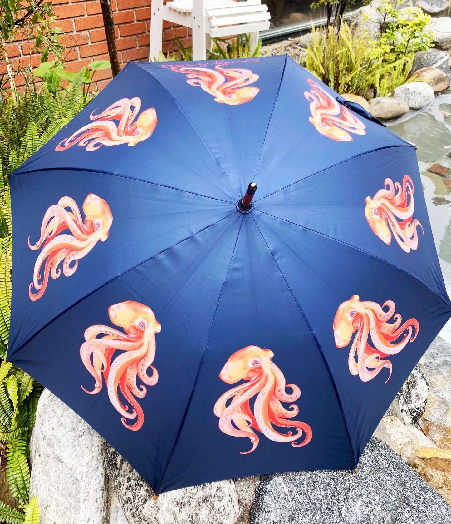 Oscar The Squid by Emily Smith | Navy and Orange Sea Life Design